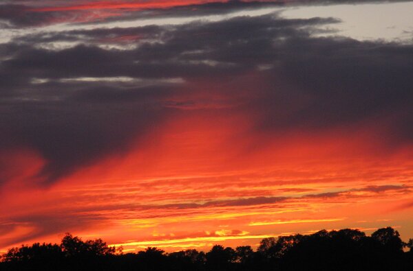 Red and black clouds at sunset