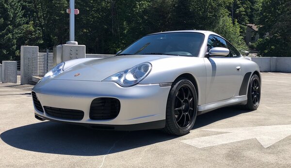 Silver car facing left 