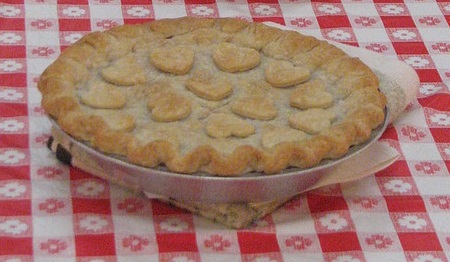 Frit pie on chequered tablecloth