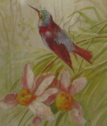 Bird lookingleft on old panel rom fairground ride