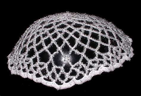 White mesh juliet cap on black background