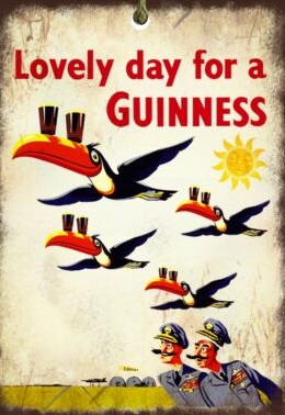 Old Guiness advertisment. Toucans flying with two glasses on  bills over two handle-bar moustahed RAF officers.                                         owo glasses on                                          s
