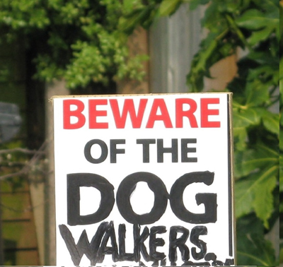 Beware of Dog sign with 'Walkers' added