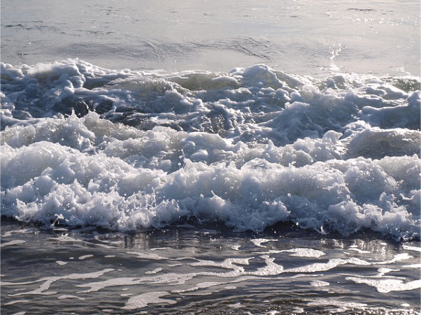 Waves breaking on a beach