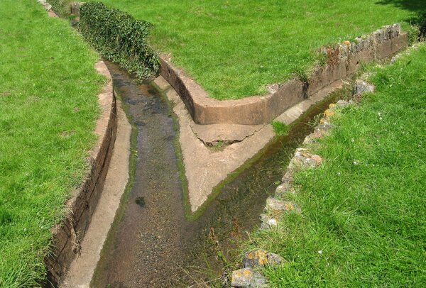 Fleet Brook Torquay Channels of Fleet brook Torquay converging rom left and right